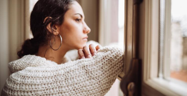 Young woman at window